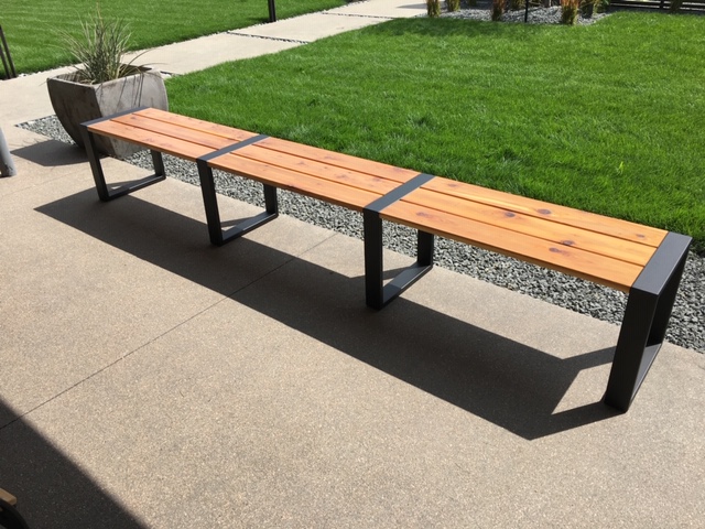 Custom crafted bench from welded metal and word work