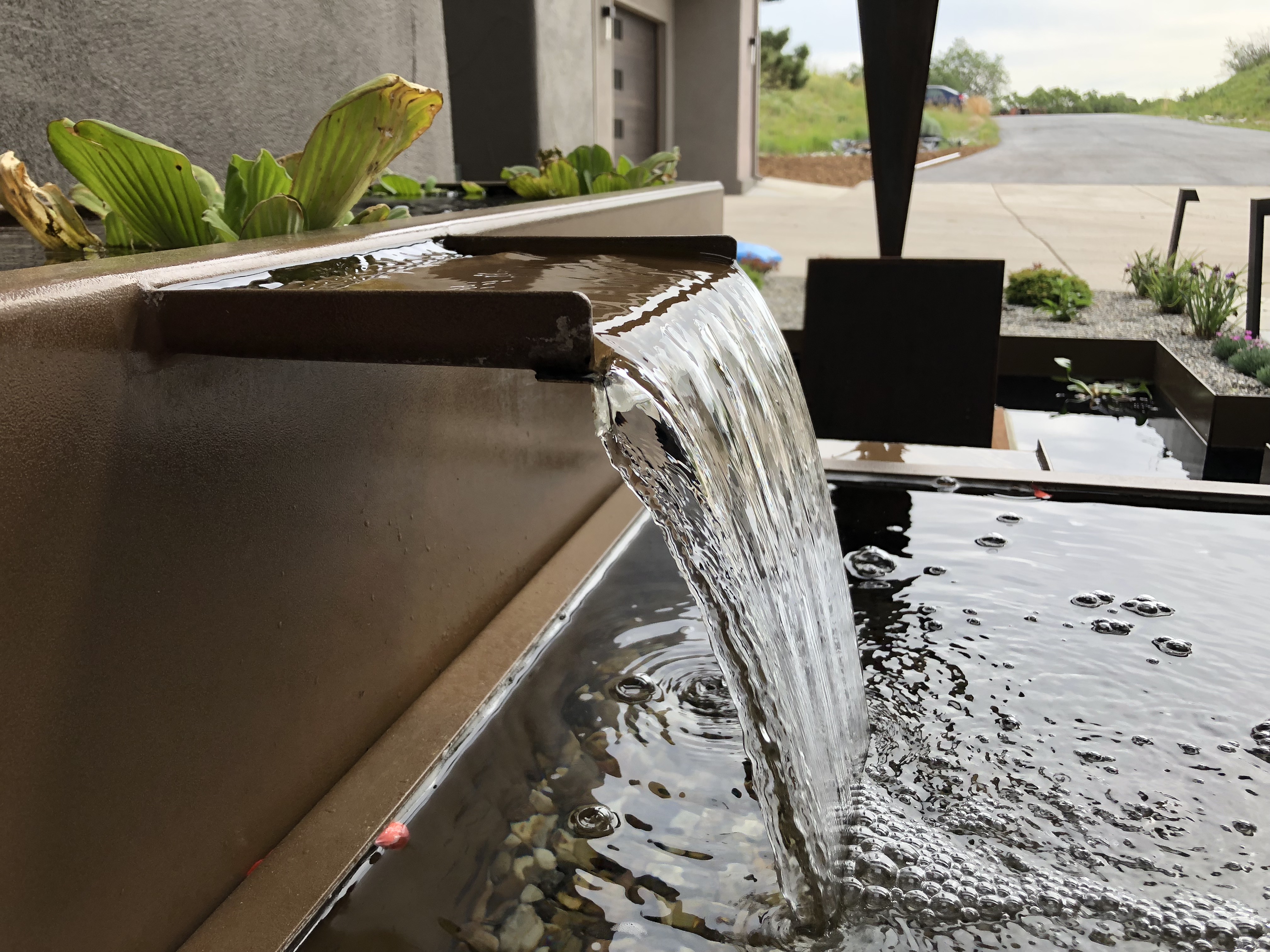 Custom welded waterfall feature